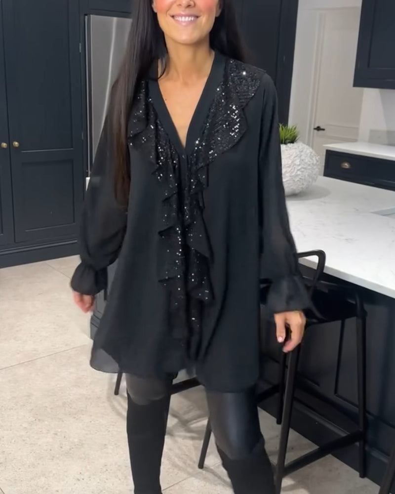 Blůza s volány a elegantním stylem